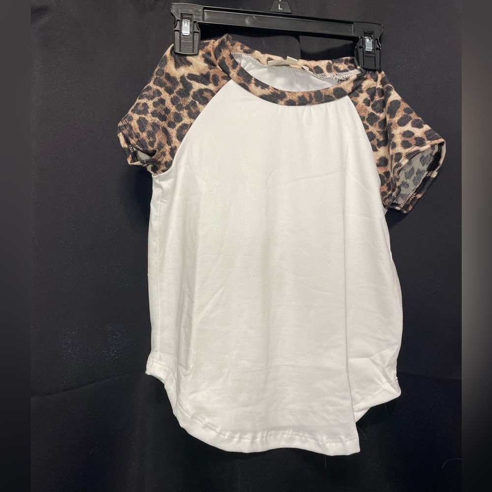 Children’s boutique T-shirt. Multiple sizes available. In original packaging